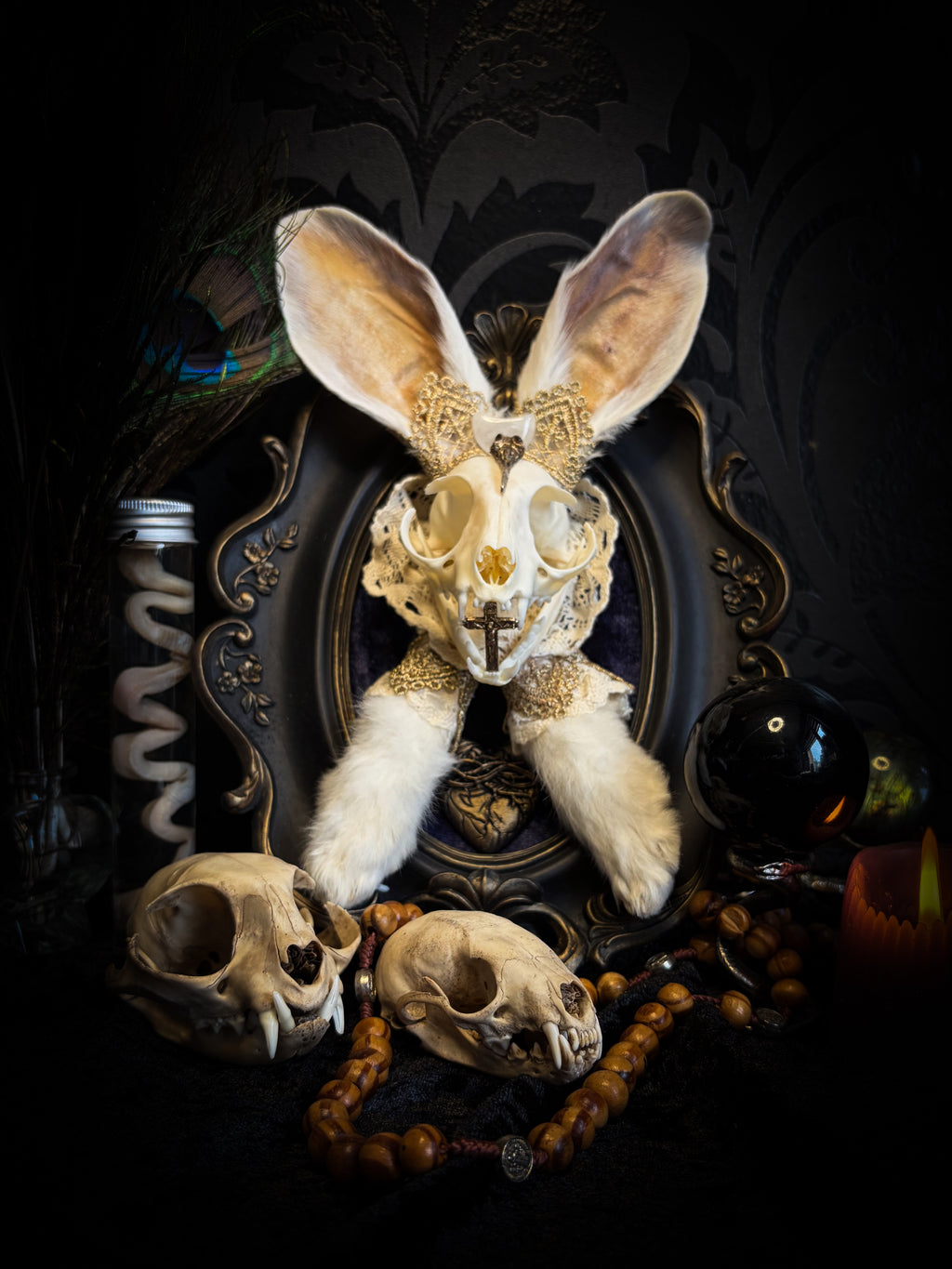 Christ Superstar | handmade Bunny Kitten puppet frame with real cat skull, albino rabbit ears and feet, golden Sacred Heart with thorns, white and gold lace, cross, white quartz moon, raven and deep navy gathered velvet in hand-cast painted baroque frame | Morbid Oddities

