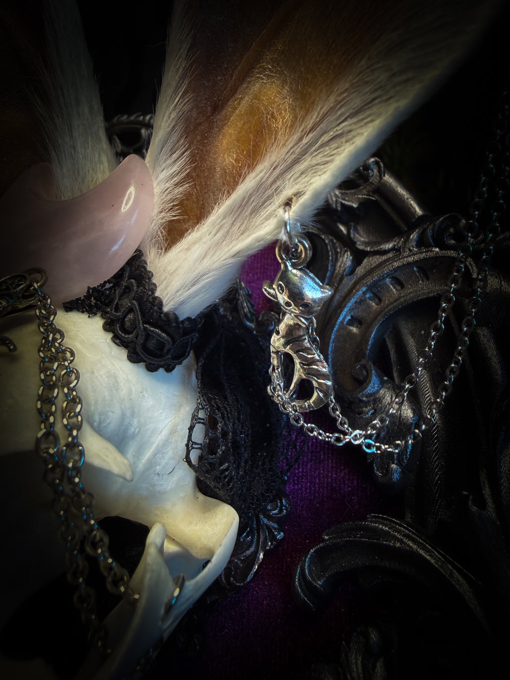 Pina Colada whimsical shadowbox — cat skull with rabbit fur ears, rose quartz orb, sword pendant and ornate silver frame