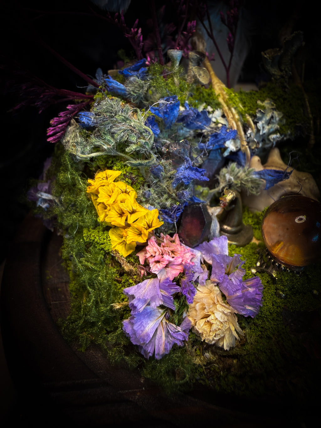 Inter Prata Fabulosa — handmade whimsical glass dome with mummified canary, crystal orb, dragon skull, wizard's hat, rolled scrolls and botanical arrangement. Morbid Oddities.