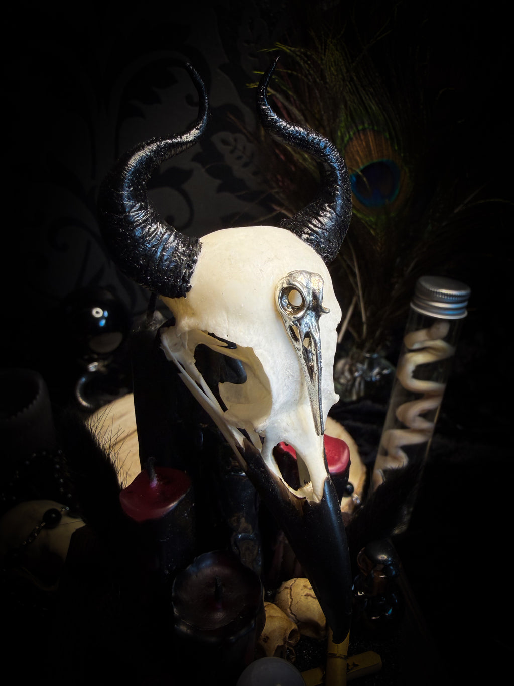 Nox Solitudinis — handmade gothic display with crow skull, hand-carved horns, crystal orb, vampire candles, wax rose and black iridescent sand. Morbid Oddities.