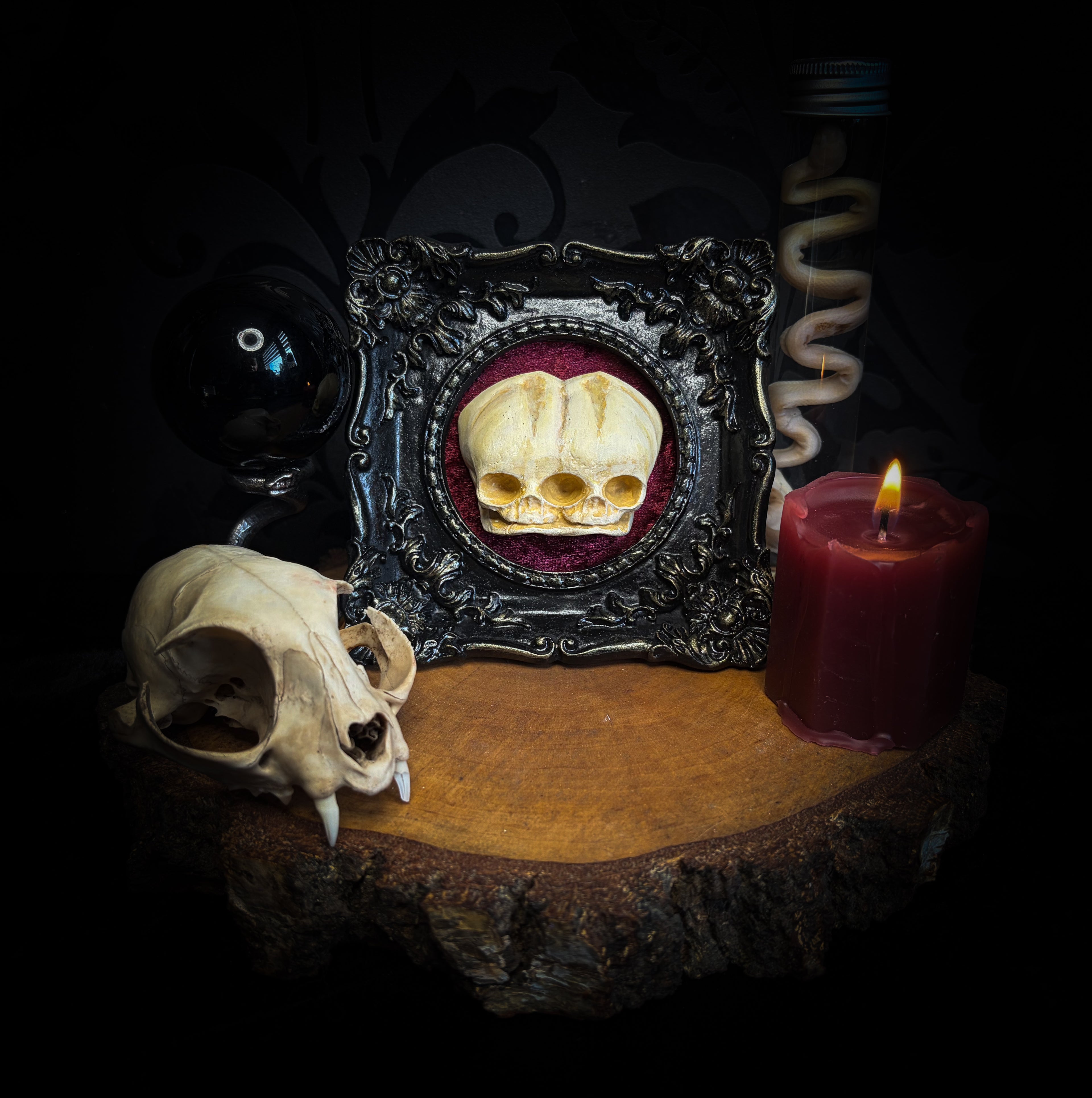 handmade gothic shadowbox conjoined infant skulls hand-cast ornamental frame black velvet dark wall decor