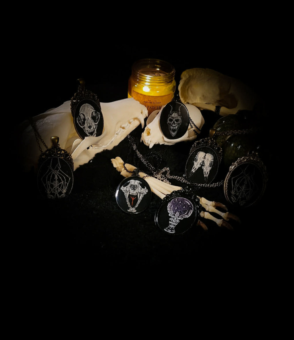 Handmade gothic necklace — hand-painted bat sigil, oval pendant with metal frame and chain, varnish finish