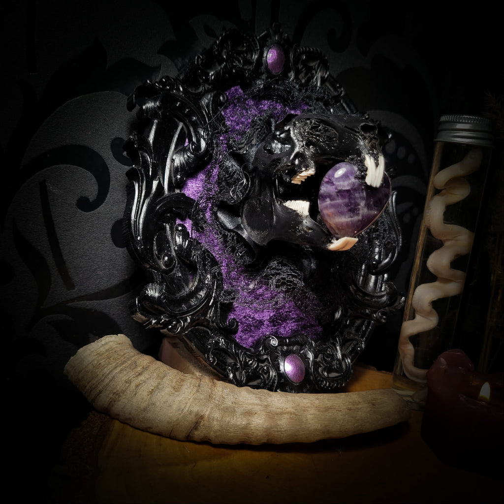 Handmade gothic shadowbox — black rabbit skull with amethyst heart, crushed purple velvet, ornate baroque frame, 19x15cm