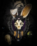 Limbo whimsical frame — cat skull with mismatched rabbit fur ears (one standing, one folded), amethyst moon, crow skull, working lantern and ornate black baroque frame