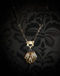 Handmade gothic necklace — real fox teeth and dried heather flowers in hexagonal resin pendant, vertebrae connector, metal bat charm