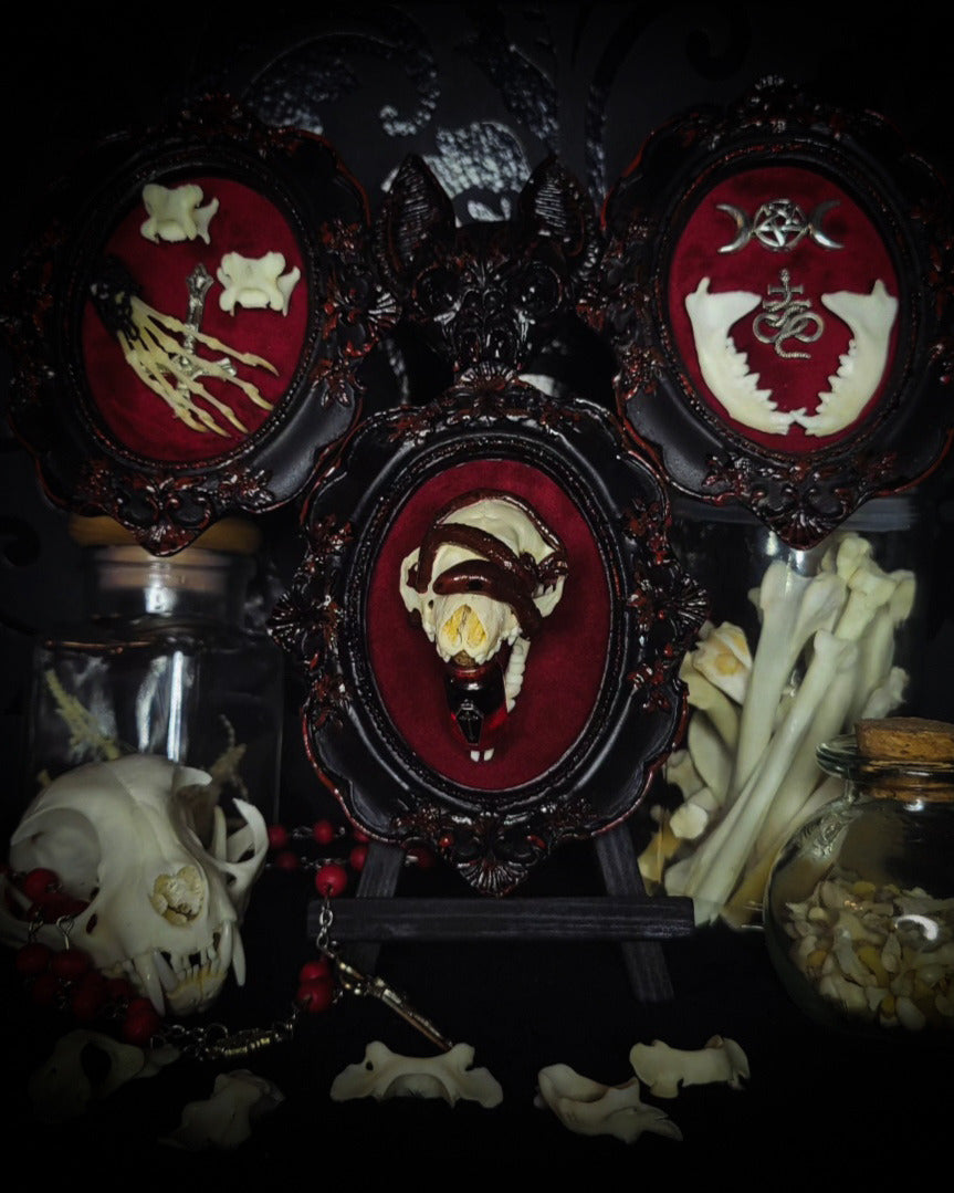 Triptych — handmade gothic triptych shadowbox, made to order. Set of 3 conjoined ornate gothic frames with real bones, skulls and decorative elements, fully hand-assembled. Dark collectible wall decor commission by Morbid Oddities.