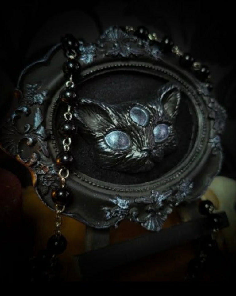 Oculus Arcani — handmade gothic shadowbox, made to order. Stylized cat head with third eye, hand-cast and hand-painted, set on velvet background in ornate baroque frame. Occult wall decor, 12x10cm.