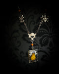Handmade gothic necklace — tiger's eye stone and mouse jaw in resin pendant, snake skin background, vertebrae connector, metal spiders, carnelian beads
